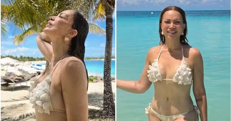 Em dia de folga, Solange Almeida renova o bronzeado em Fortaleza e se refresca em ducha